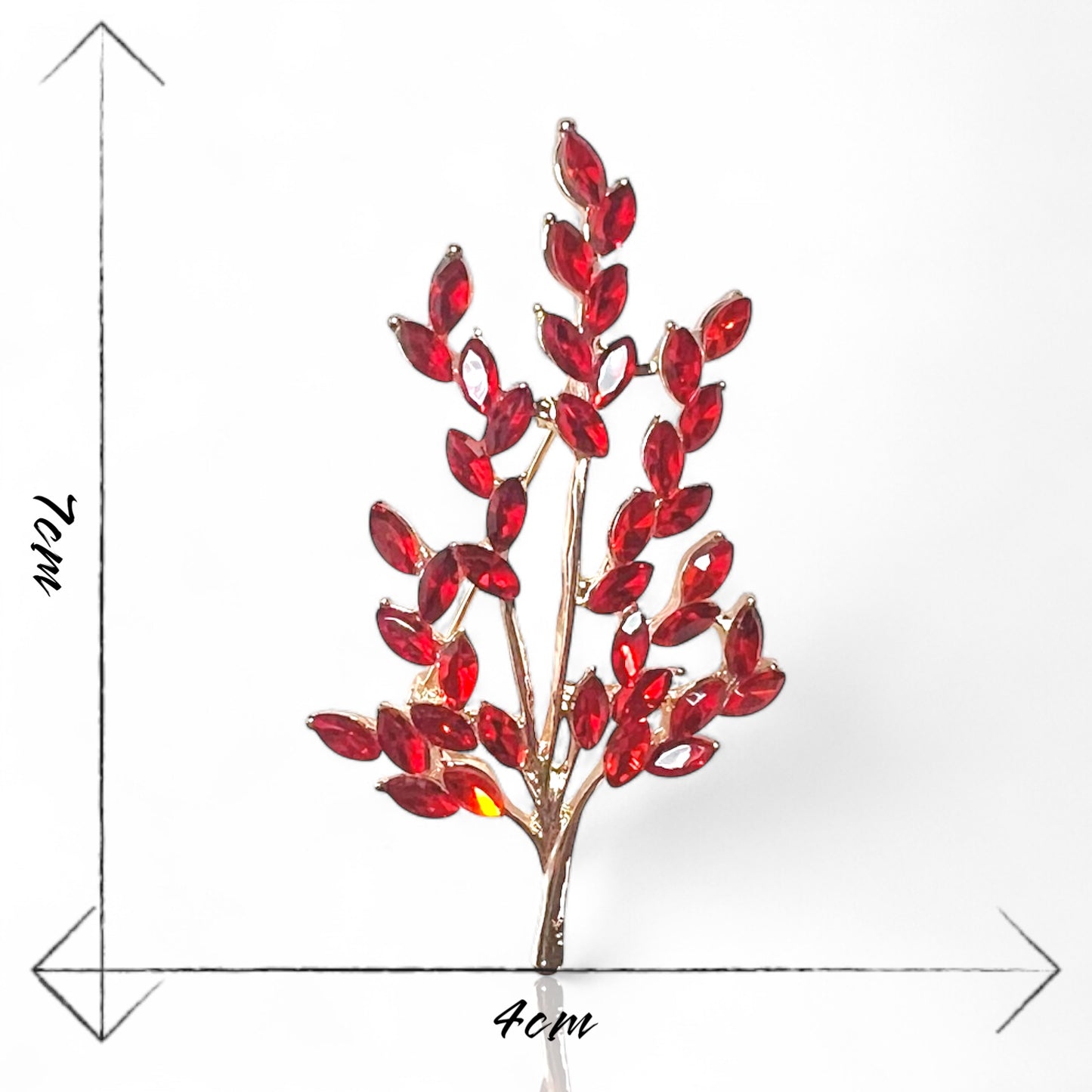Broche branche à feuilles rouges