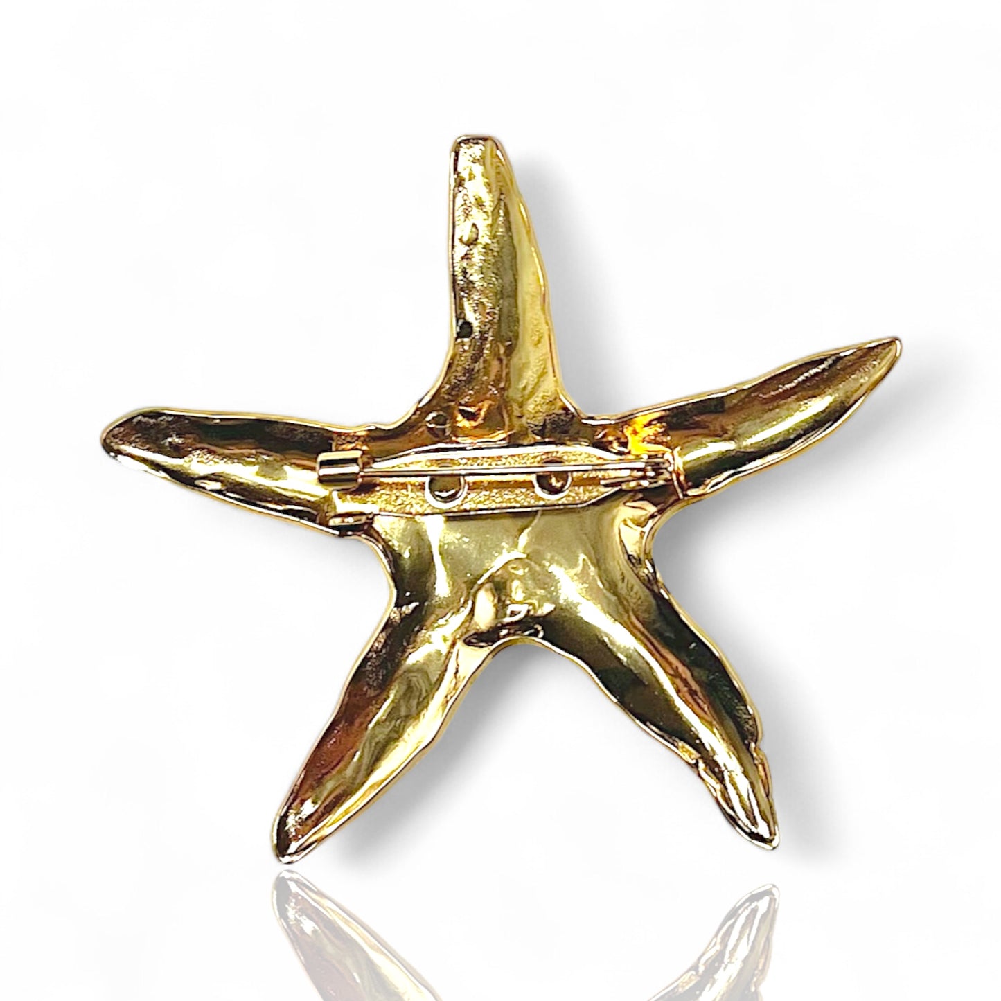 Broche étoile de mer dorée