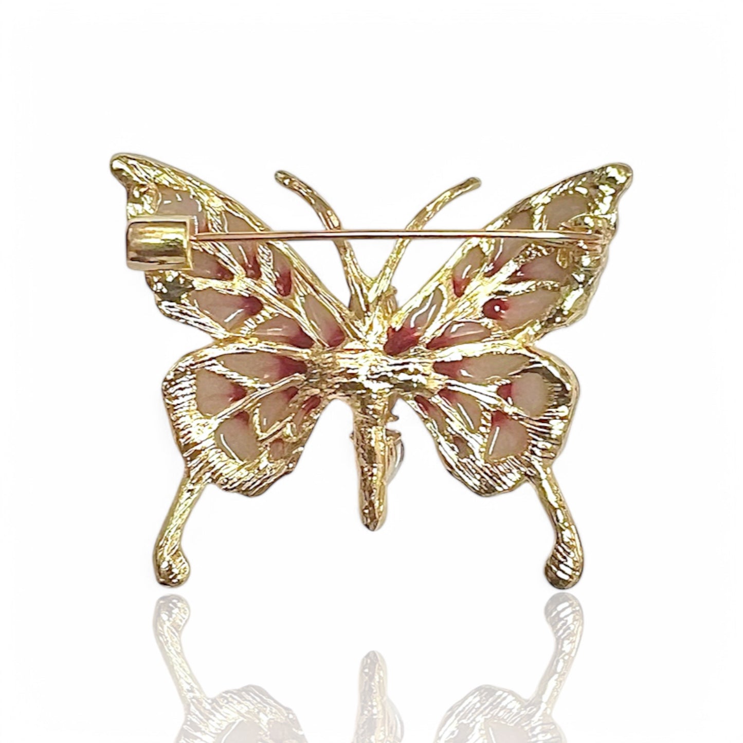 Broche papillon rose