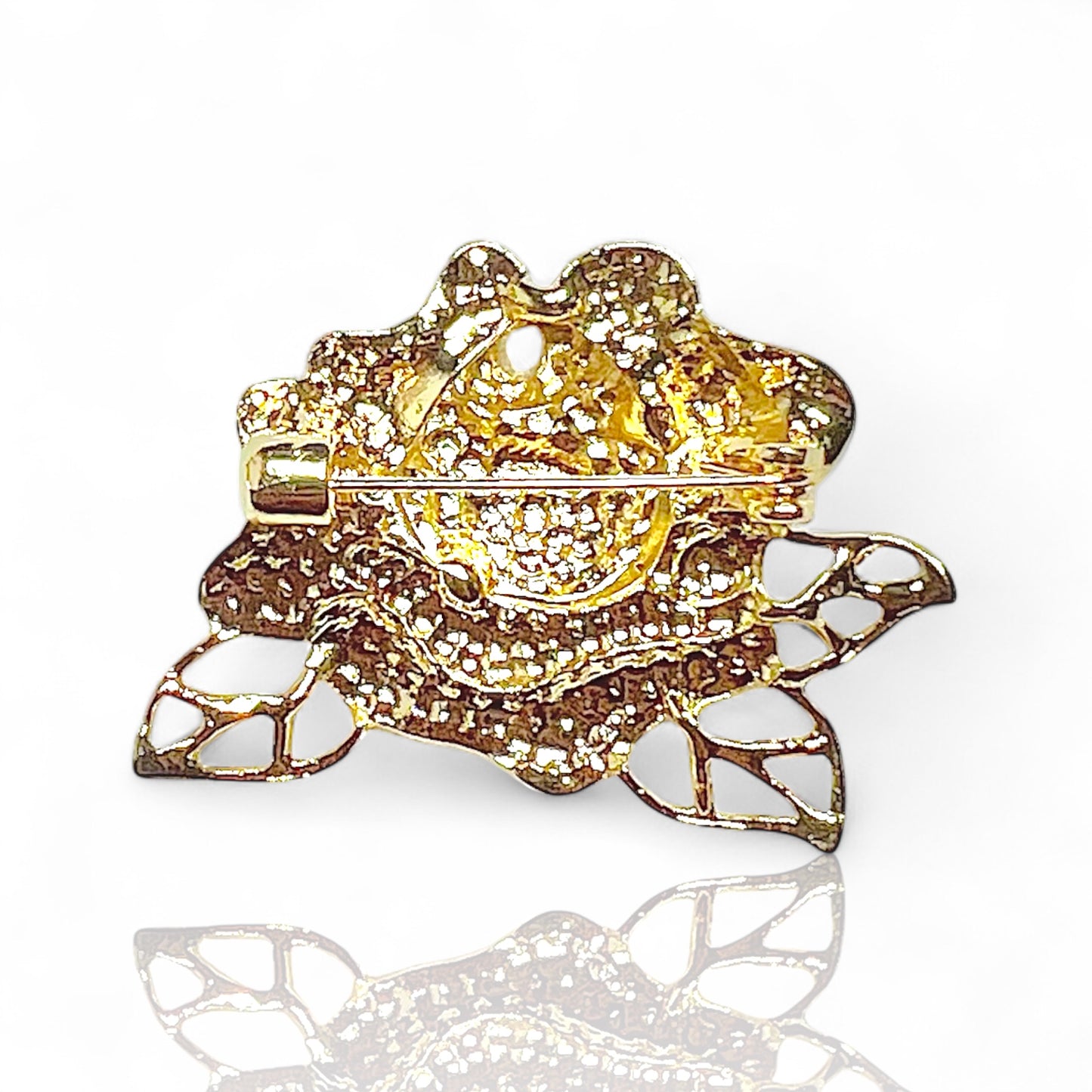 Broche rose à strass