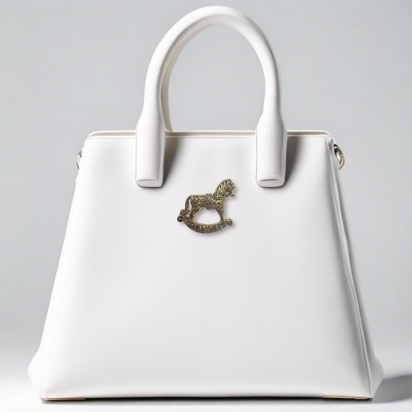 Broche cheval à bascule Elva