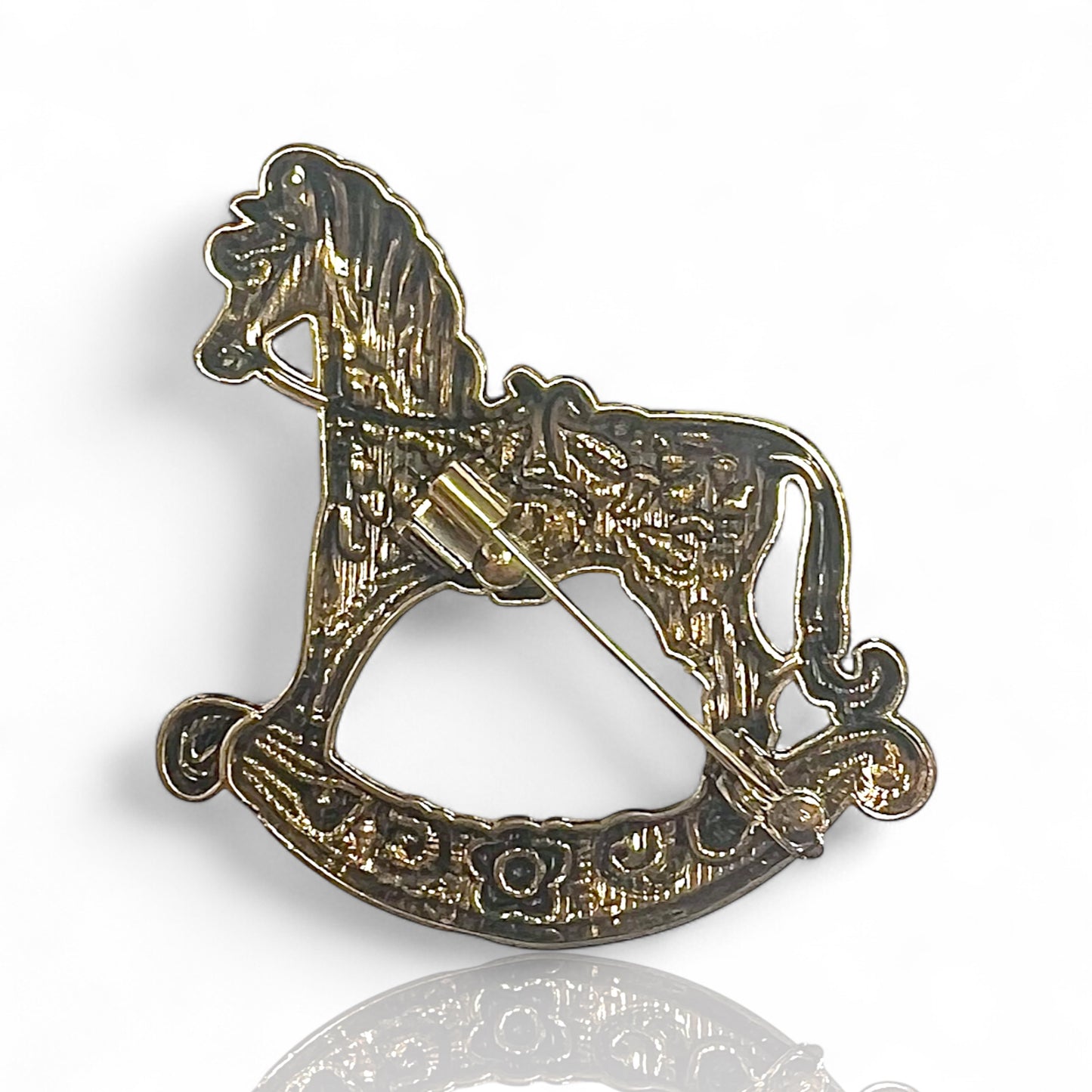 Broche cheval à bascule Elva