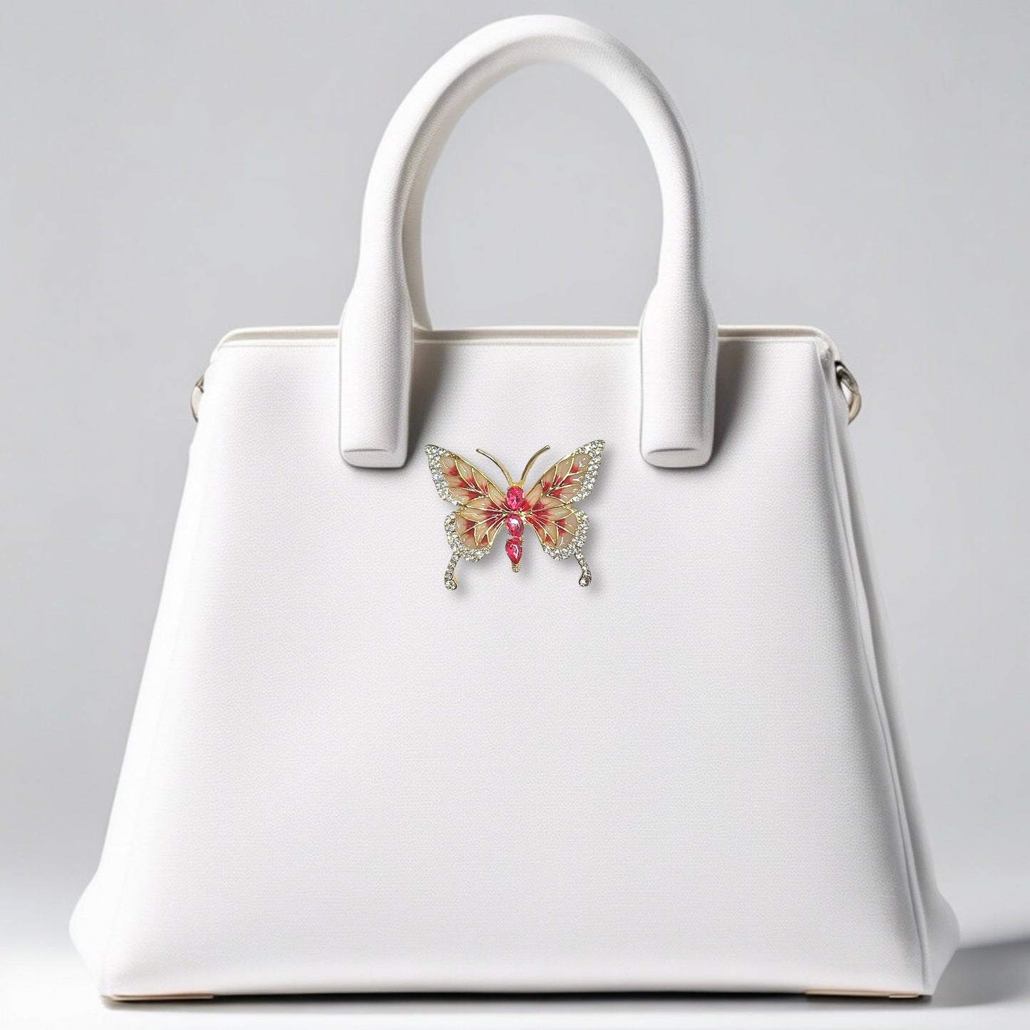 Broche papillon rose