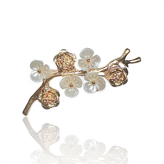 Broche branche à fleurs