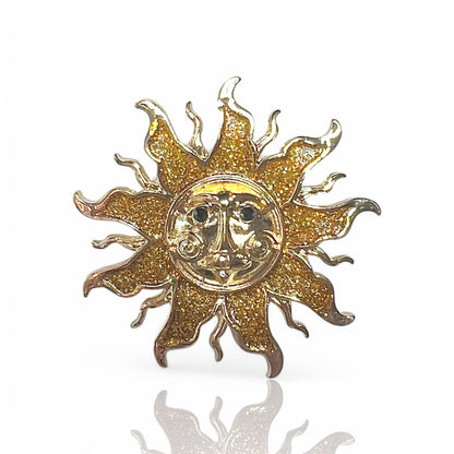 Broche soleil pailleté