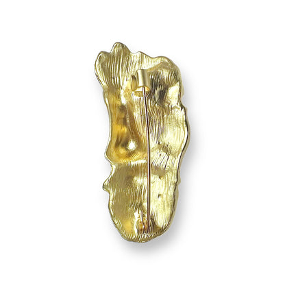 Broche visage