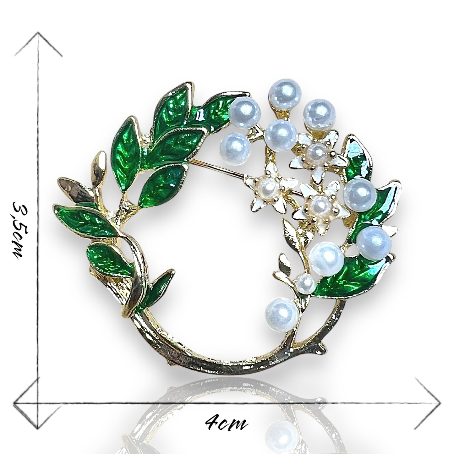 Broche couronne de feuilles et perles