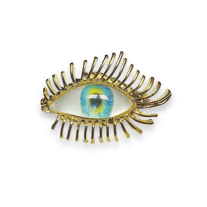 Broche oeil doré