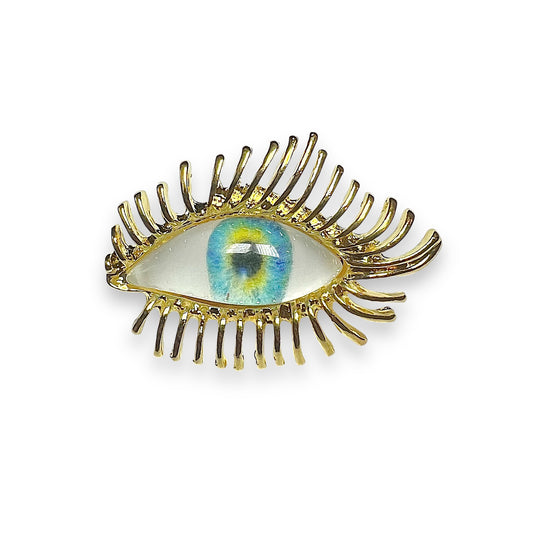 Broche oeil doré