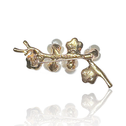 Broche branche à fleurs