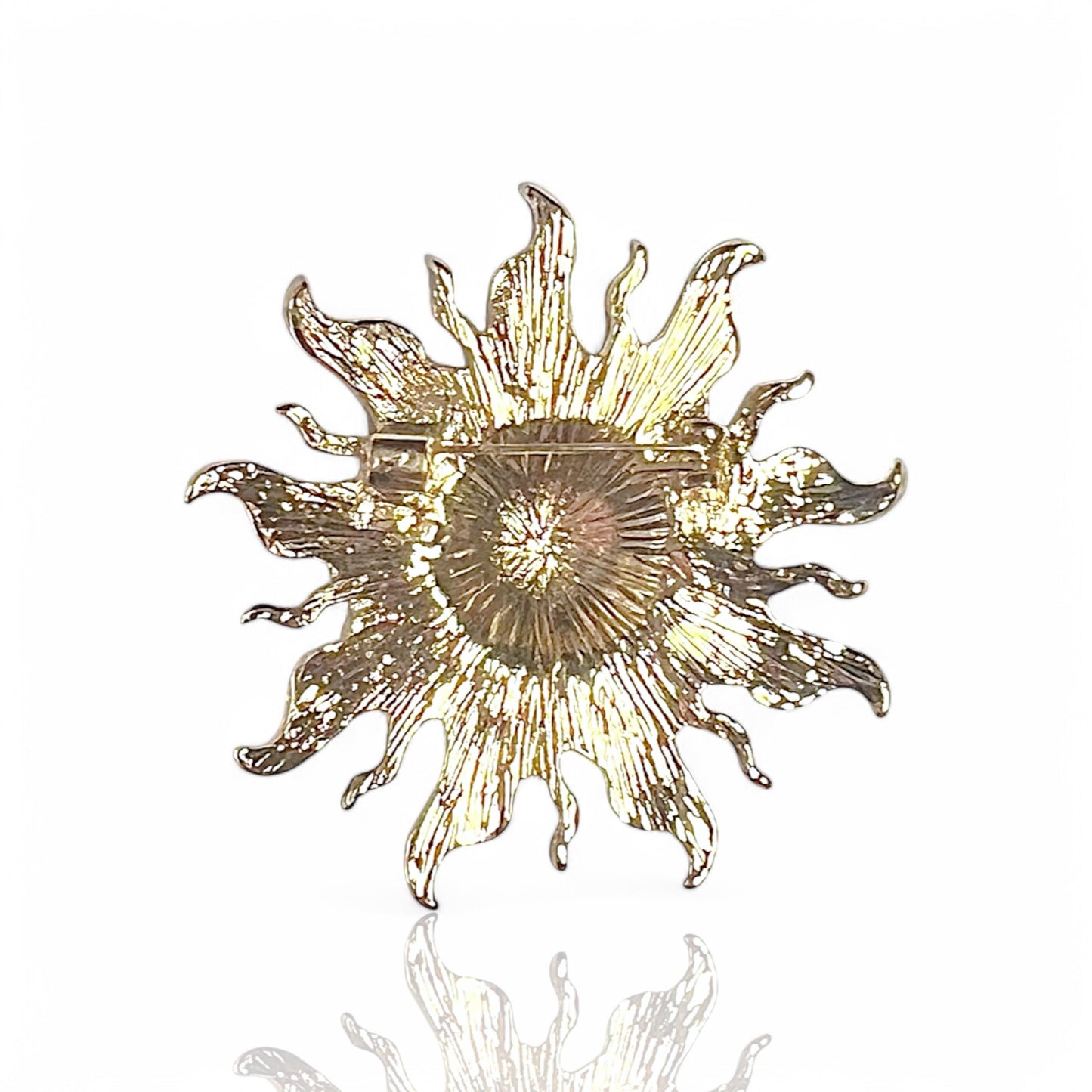Broche soleil pailleté