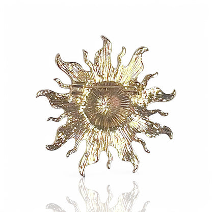 Broche soleil pailleté