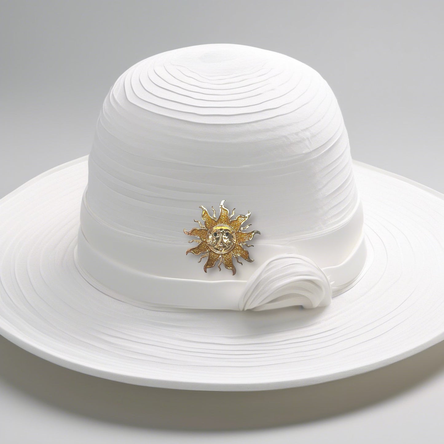 Broche soleil pailleté