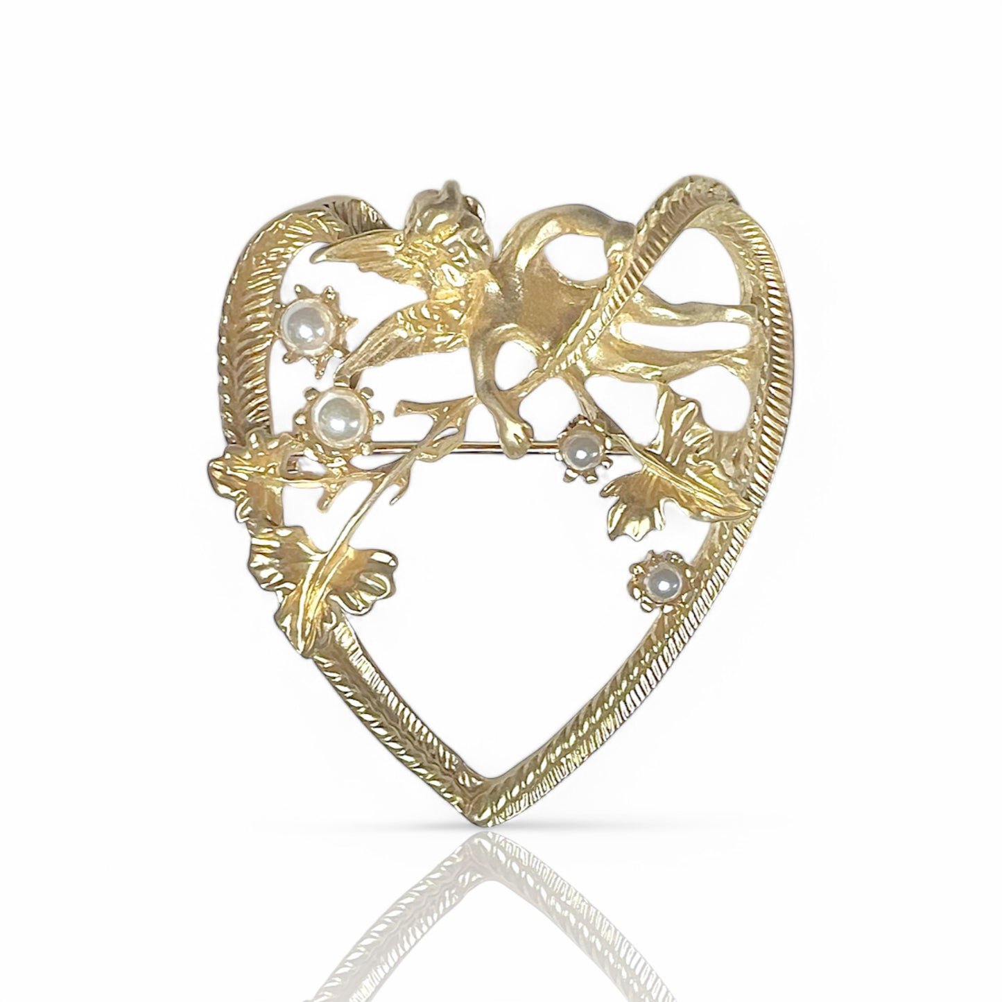 Broche coeur avec ange