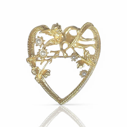 Broche coeur avec ange