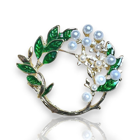 Broche couronne de feuilles et perles