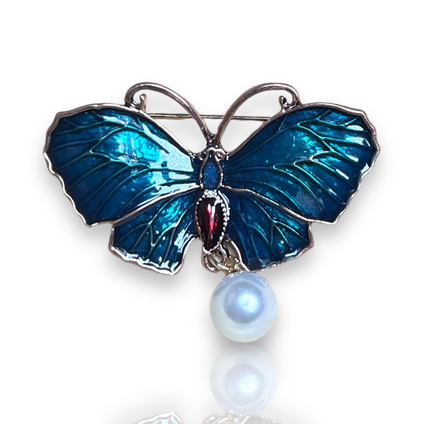 Broche papillon bleu nuit et perle